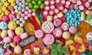 Find the ant brain teaser challenge: only those with a high IQ can spot the sneaky ant amid the sweets in under 8 seconds!